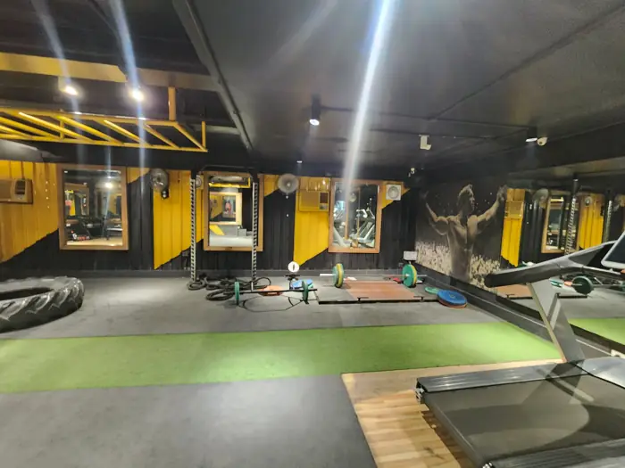 Functional training area with turf lane and yellow rig