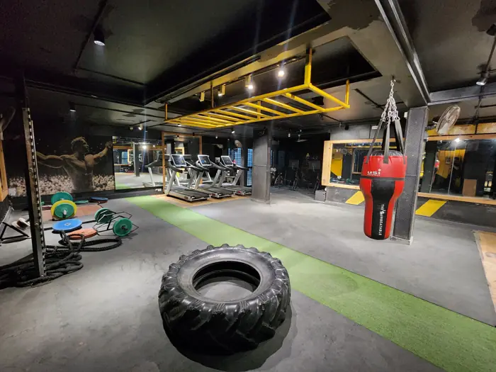Tyre, punch bag and turf in the functional training area
