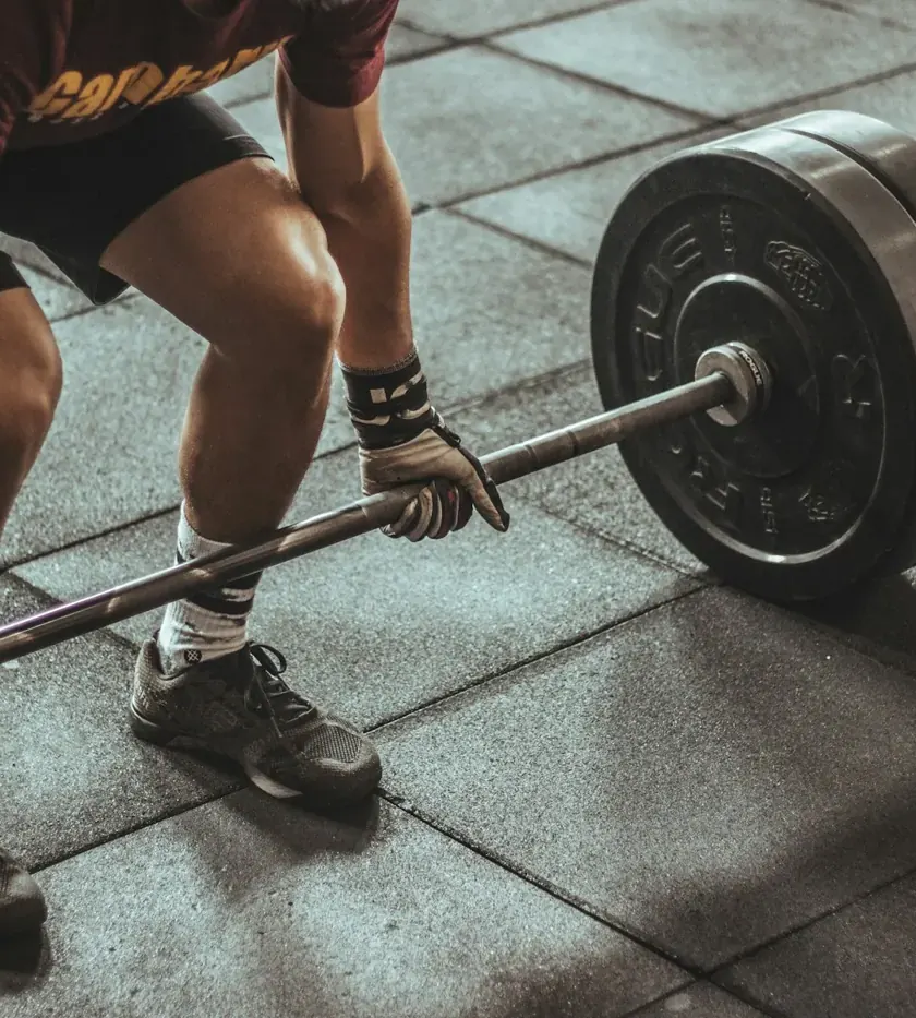 Lifter setting up a heavy deadlift